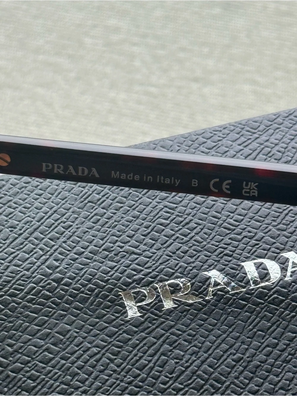 Prada Black Textured Leather Wallet with Silver Logo
